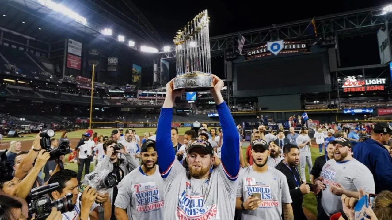 The World Series champions holding a trophy over their heads.